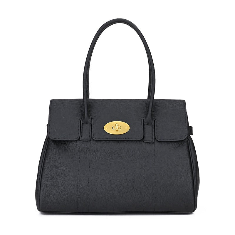 Svart klassisk handväska med guldlås och tidlös design – Itsbag