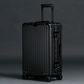 Itsbag.se black aluminum travel suitcase with TSA lock and 360° wheels, adjustable handle, ribbed design.