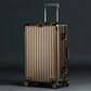 Itsbag.se bronze aluminum-magnesium alloy suitcase with TSA lock and 360° wheels.